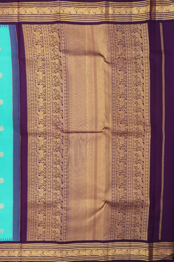 Kanchipuram Silk Saree In Turquoise Blue With Peacock Buttas