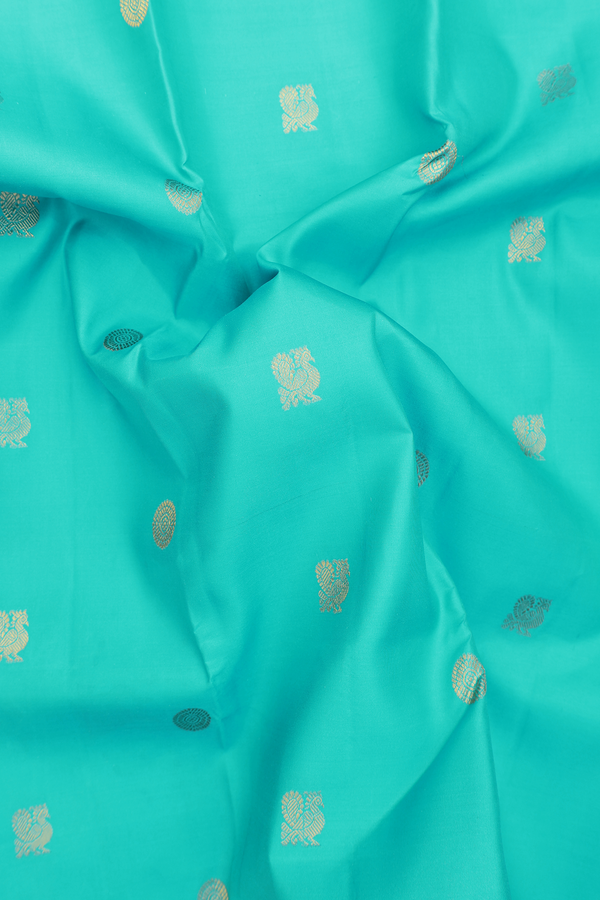 Kanchipuram Silk Saree In Turquoise Blue With Peacock Buttas