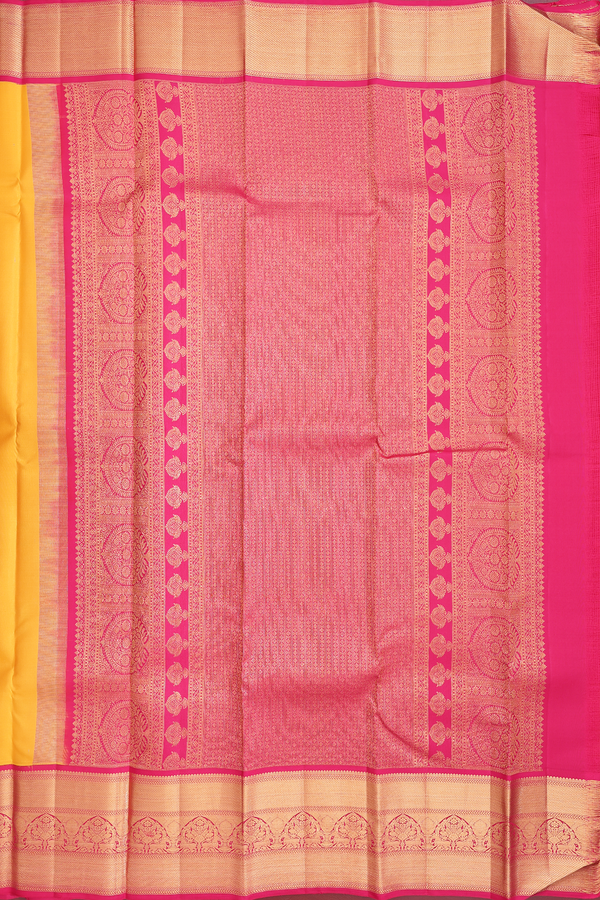 Kanchipuram Silk Saree In Saffron Yellow With Floral Buttas