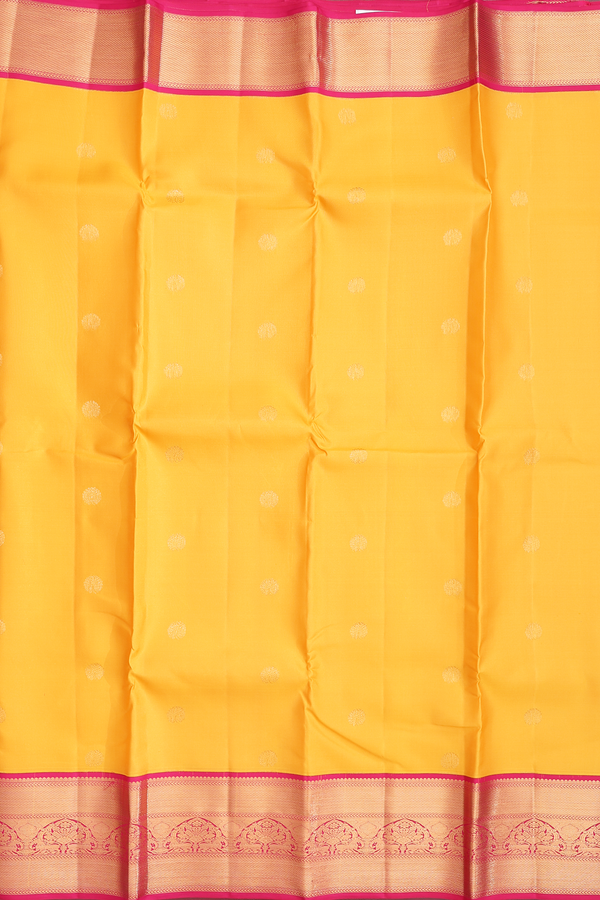 Kanchipuram Silk Saree In Saffron Yellow With Floral Buttas