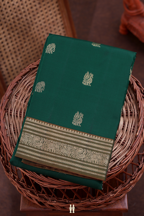 Kanchipuram Silk Saree In Forest Green With Peacock Buttas