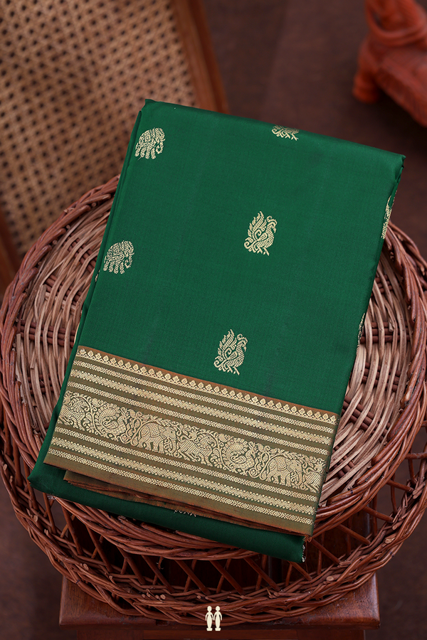 Kanchipuram Silk Saree In Forest Green With Peacock Buttas