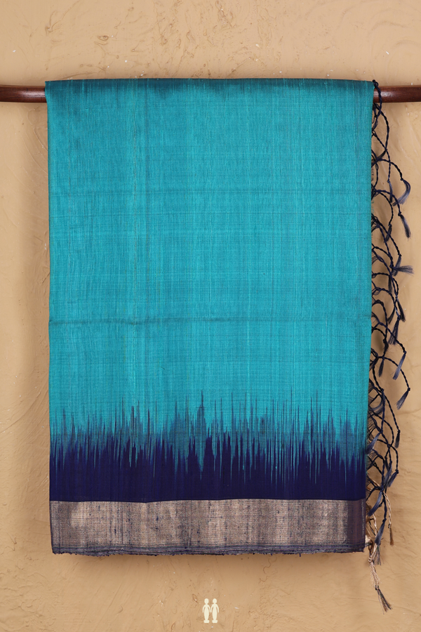 Raw Silk Saree In Plain Blue With Contrast Border