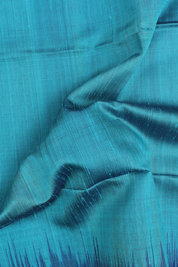 Raw Silk Saree In Plain Blue With Contrast Border