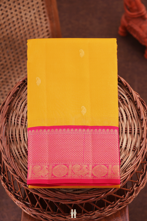 Kanchipuram Silk Saree In Saffron Yellow With Paisley Buttas