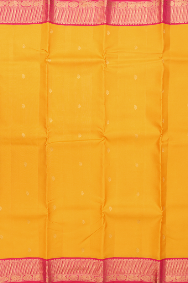 Kanchipuram Silk Saree In Saffron Yellow With Paisley Buttas