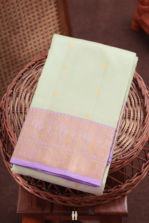 Kanchipuram Silk Saree In Pale Green With Zari Buttas
