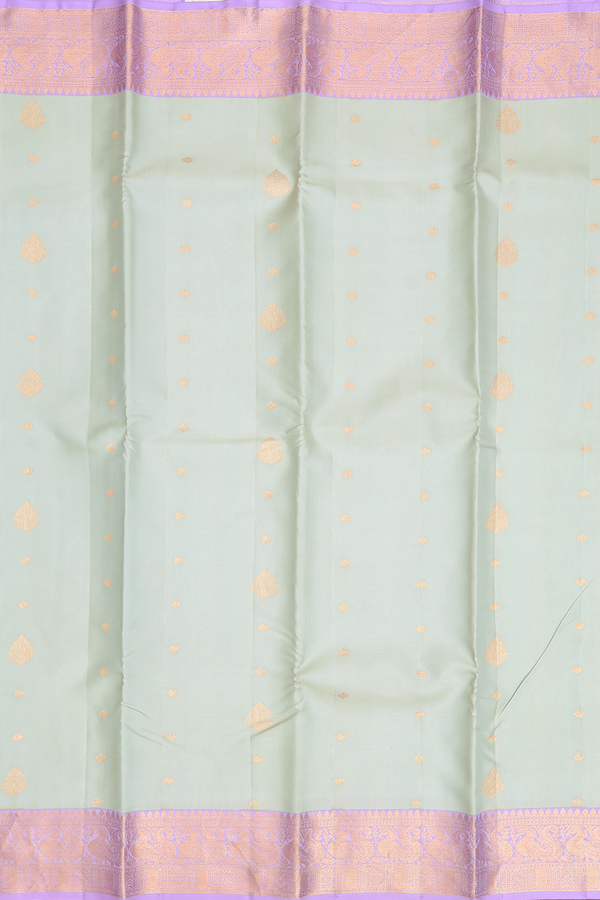 Kanchipuram Silk Saree In Pale Green With Zari Buttas