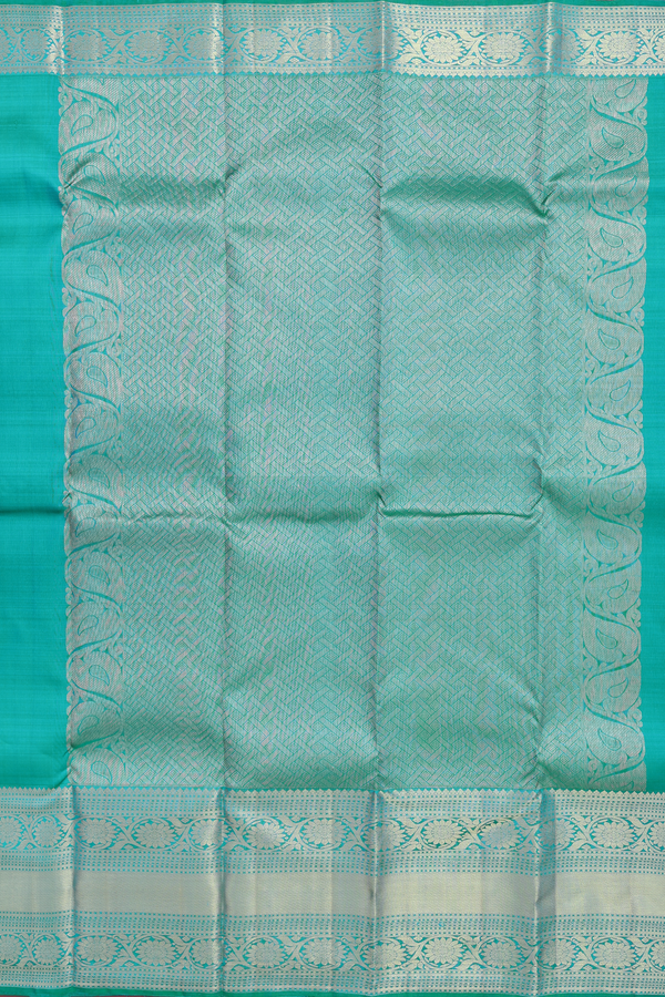 Kanchipuram Silk Saree In Peacock Blue With Zari Buttas