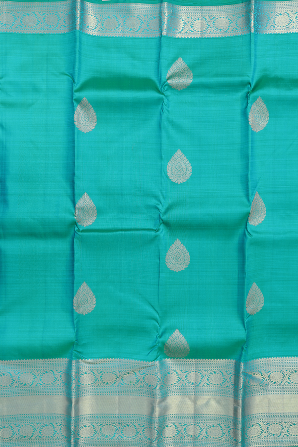 Kanchipuram Silk Saree In Peacock Blue With Zari Buttas