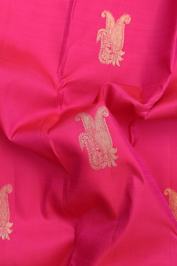Kanchipuram Silk Saree In Rani Pink With Paisley Buttas