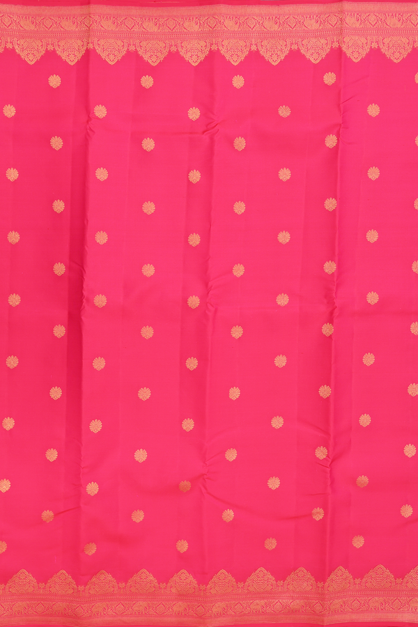 Kanchipuram Silk Saree In Rani Pink With Floral Buttas
