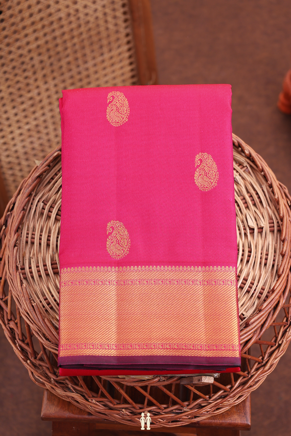 Kanchipuram Silk Saree In Rani Pink With Paisley Buttas