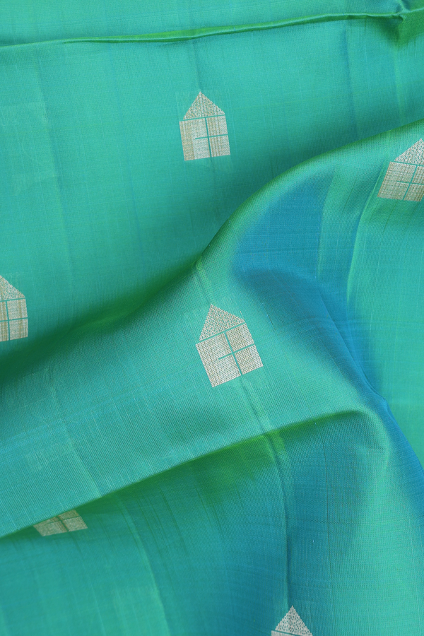 Soft Silk Saree In Bluish Green With Threadwork Buttas