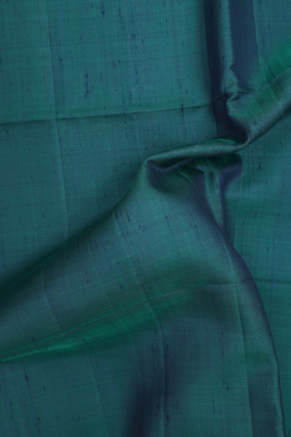 Raw Silk Saree In Teal Blue With Iruthalai Pakshi Pallu