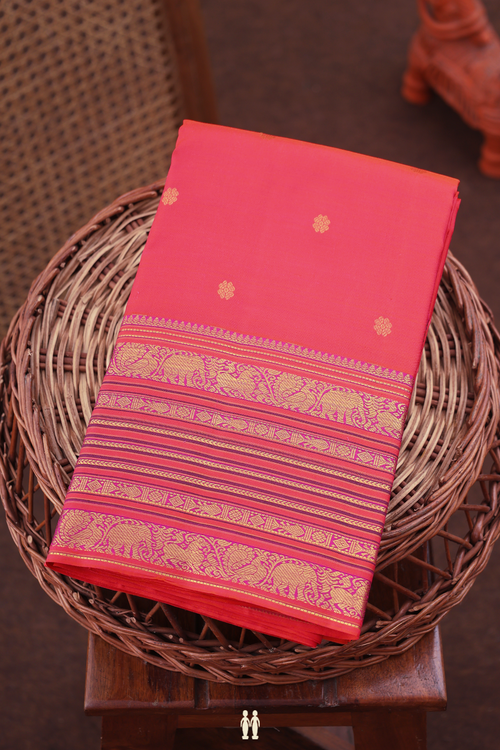 Kanchipuram Silk Saree In Coral Pink With Floral Buttas