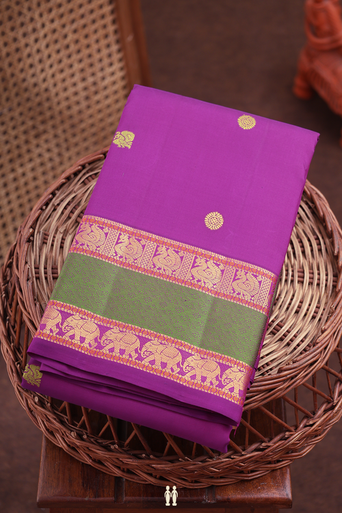 Kanchipuram Silk Saree In Purple With Peacock Buttas