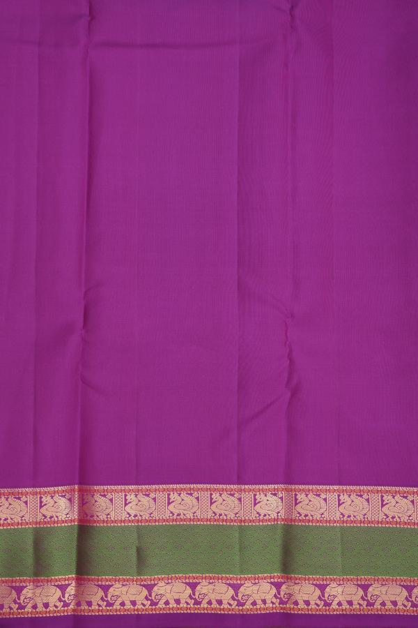 Kanchipuram Silk Saree In Purple With Peacock Buttas