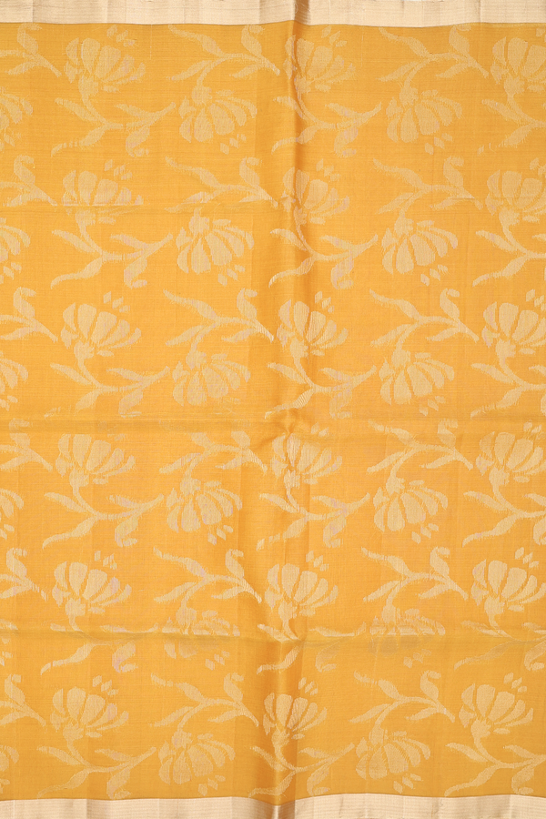 Raw Silk Saree In Saffron Yellow With Floral Design