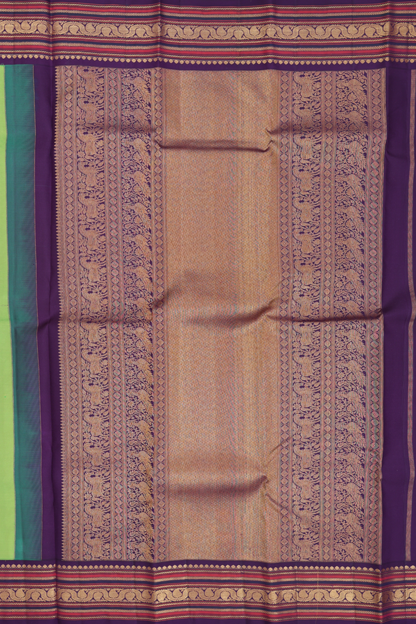 Kanchipuram Silk Saree In Parrot Green With Floral Buttis