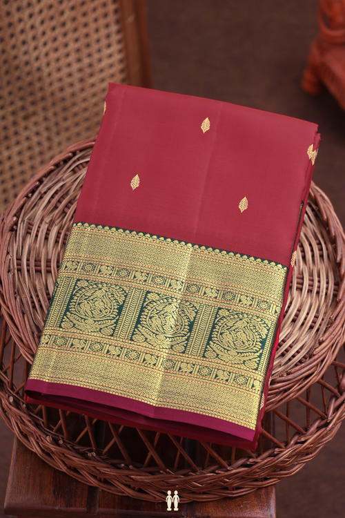 Kanchipuram Silk Saree In Crimson Red With Zari Buttas