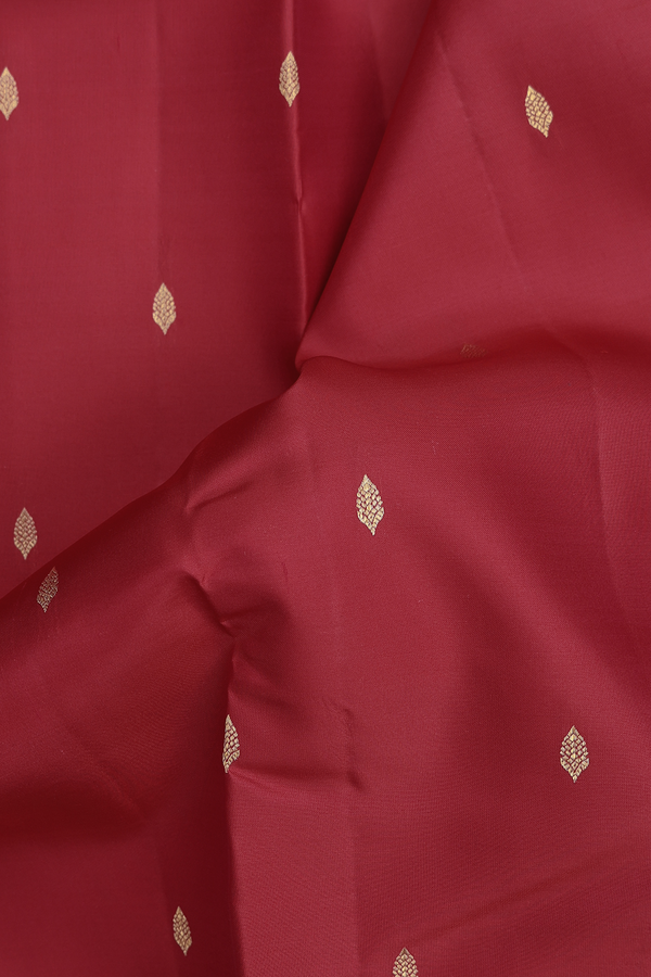 Kanchipuram Silk Saree In Crimson Red With Zari Buttas