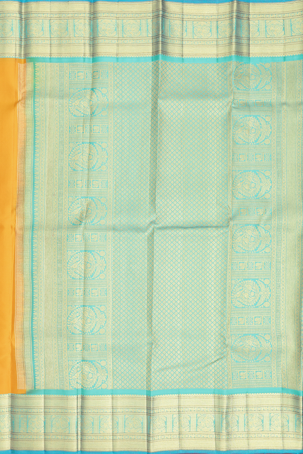 Kanchipuram Silk Saree In Saffron Yellow With Zari Buttas
