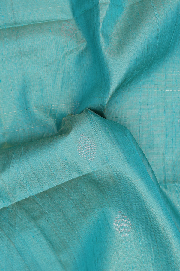 Tissue Raw Silk Saree In Bluish Green With Diamond Buttas
