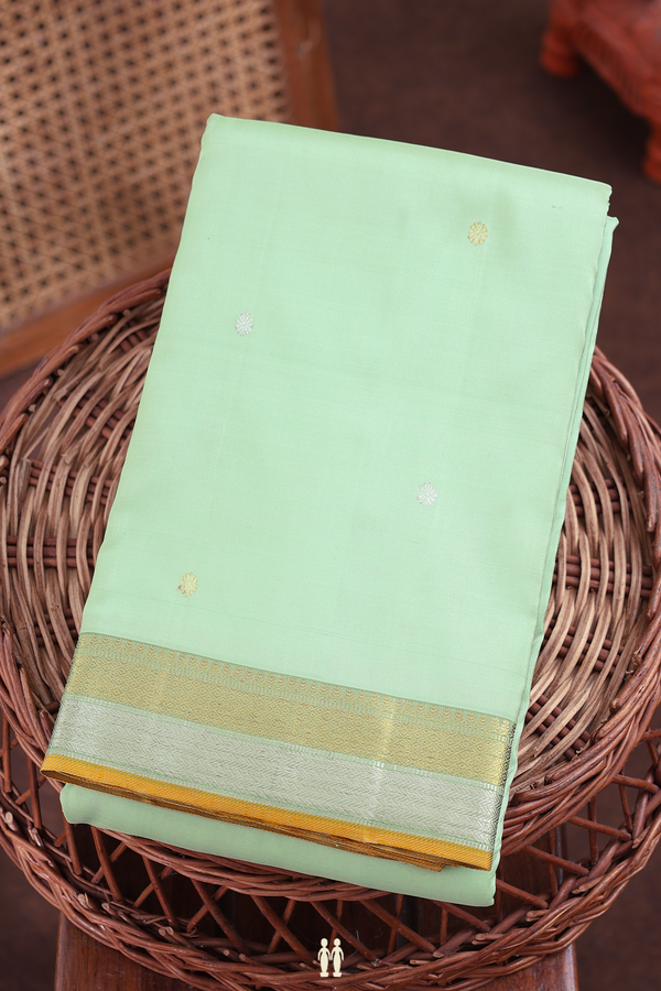 Kanchipuram Silk Saree In Pastel Green With Floral Buttas