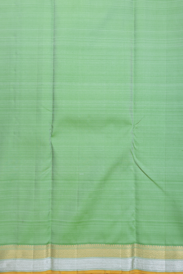 Kanchipuram Silk Saree In Pastel Green With Floral Buttas