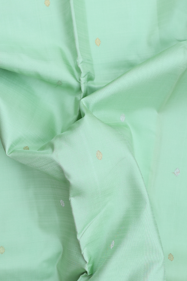 Kanchipuram Silk Saree In Pastel Green With Floral Buttas