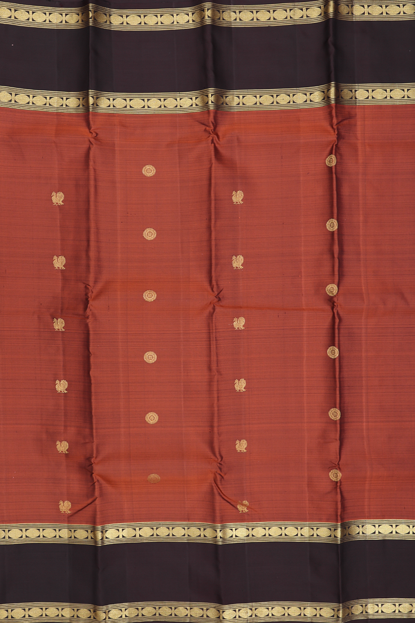 Kanchipuram Silk Saree In Rust Orange With Chakram Buttas
