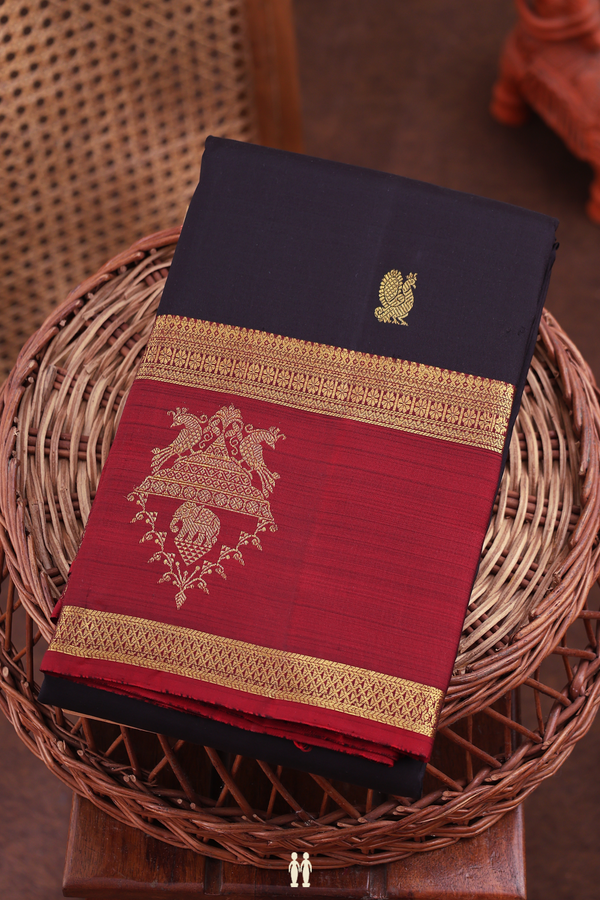 Kanchipuram Silk Saree In Black With Peacock Buttas