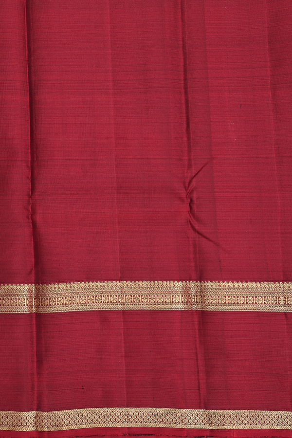 Kanchipuram Silk Saree In Black With Peacock Buttas