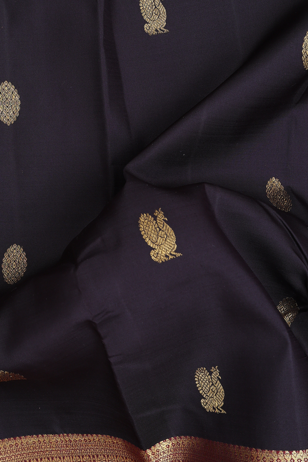 Kanchipuram Silk Saree In Black With Peacock Buttas