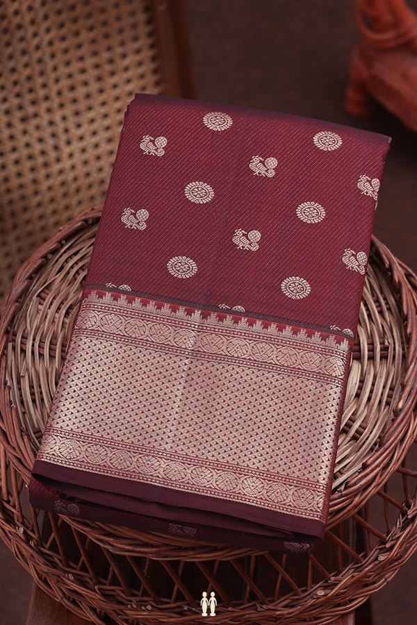Kanchipuram Silk Saree In Maroon Along Stripes With Buttas