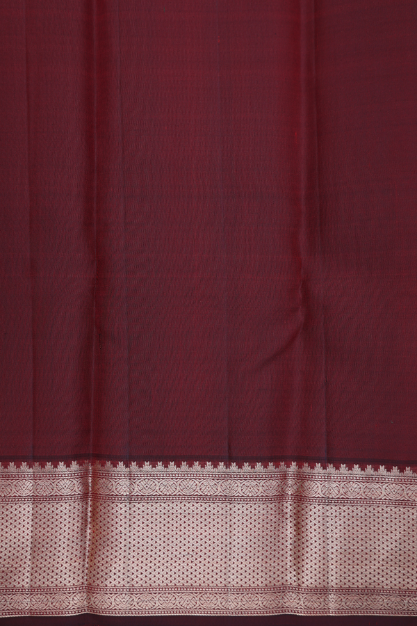 Kanchipuram Silk Saree In Maroon Along Stripes With Buttas