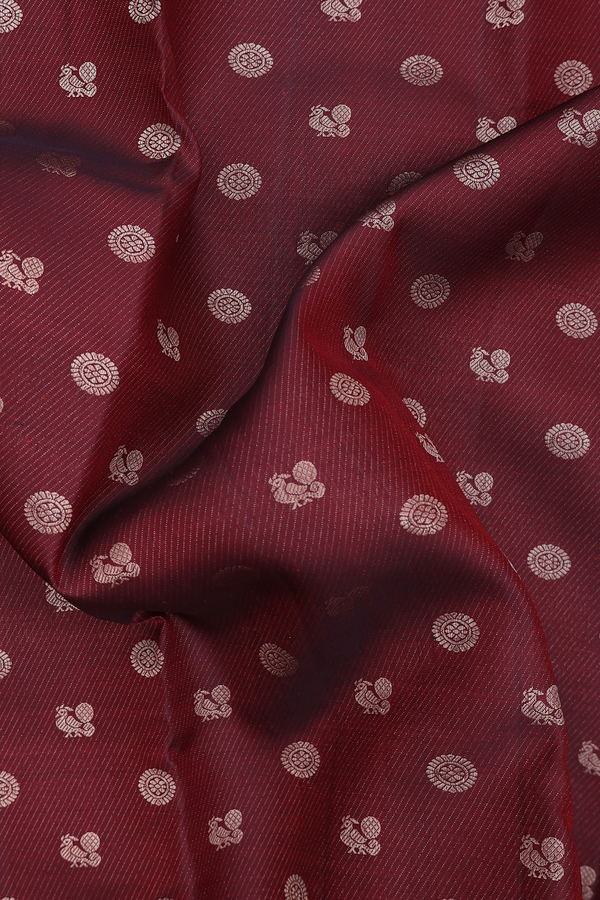 Kanchipuram Silk Saree In Maroon Along Stripes With Buttas