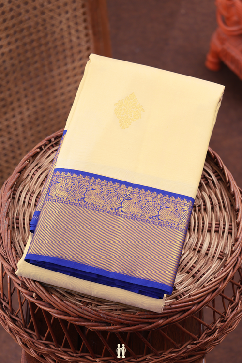 Kanchipuram Silk Saree In Cream Color With Zari Buttas