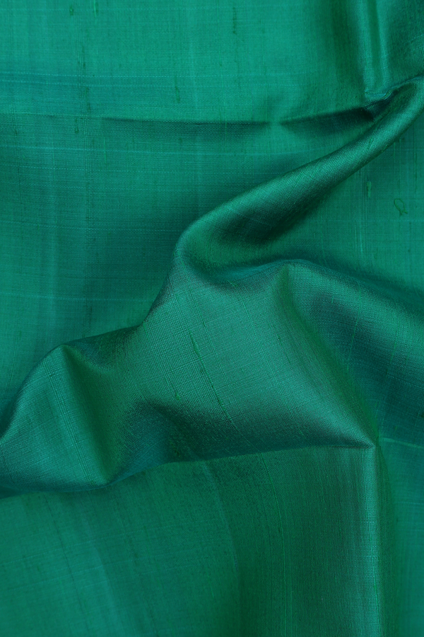Raw Silk Saree In Teal Green With Zari Border