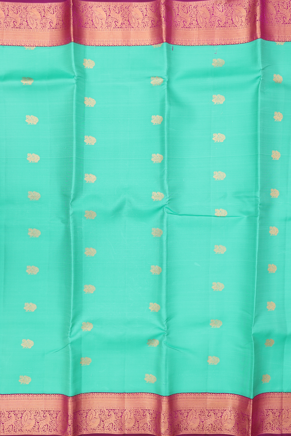Kanchipuram Silk Saree In Green With Peacock Buttas