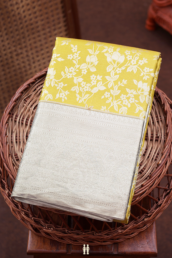 Kanchipuram Silk Saree In Yellow Tissue With Floral Design