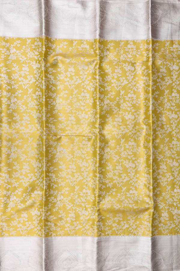 Kanchipuram Silk Saree In Yellow Tissue With Floral Design