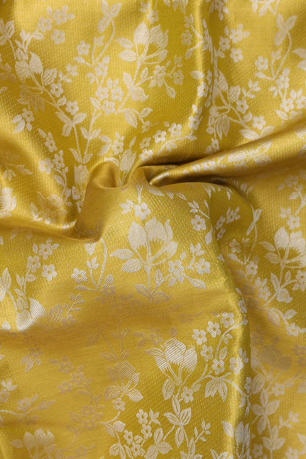 Kanchipuram Silk Saree In Yellow Tissue With Floral Design
