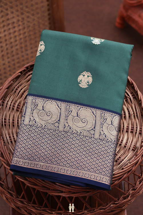 Kanchipuram Silk Saree In Green With Iruthalai Pakshi Buttas