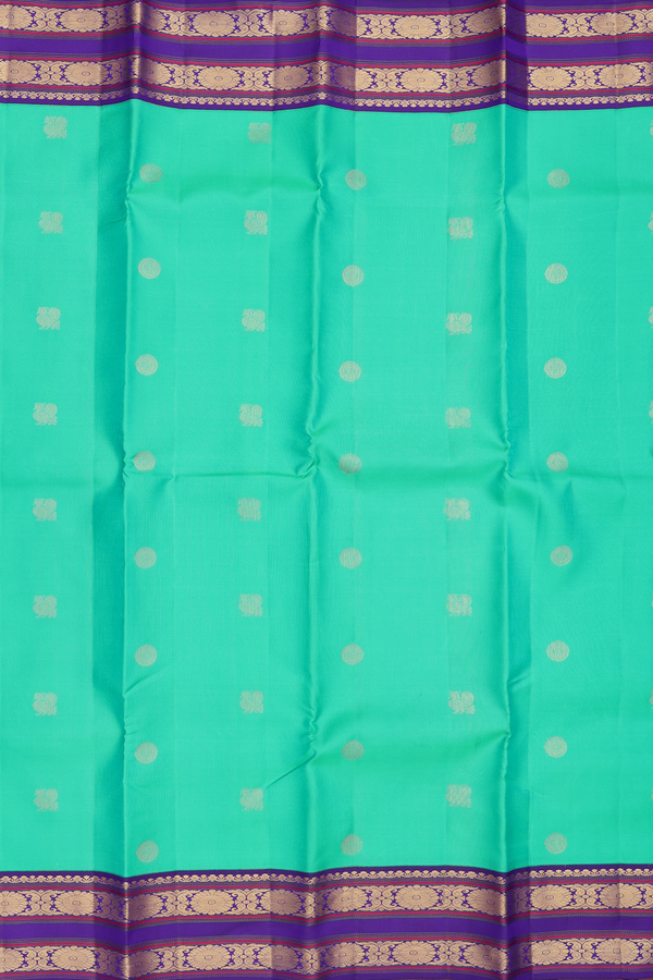 Kanchipuram Silk Saree In Green With Peacock Buttas