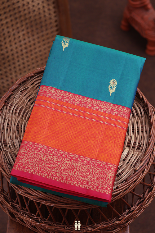 Kanchipuram Silk Saree In Teal Blue With Floral Buttas