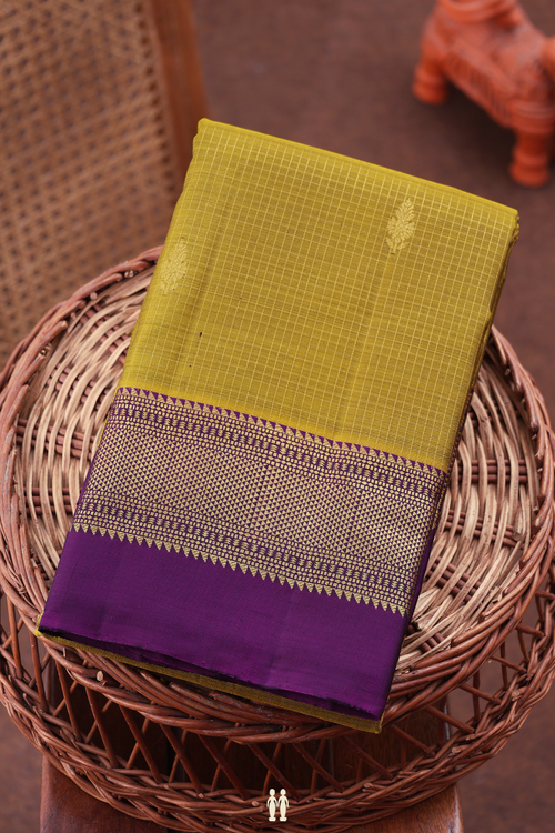 Kanchipuram Silk Saree In Brownish Yellow With Checks Design
