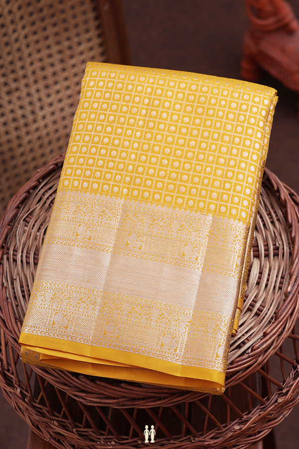 Kanchipuram Silk Saree In Saffron Yellow With Brocade Design