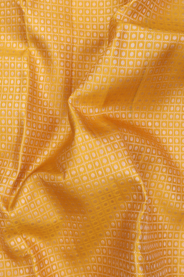 Kanchipuram Silk Saree In Saffron Yellow With Brocade Design